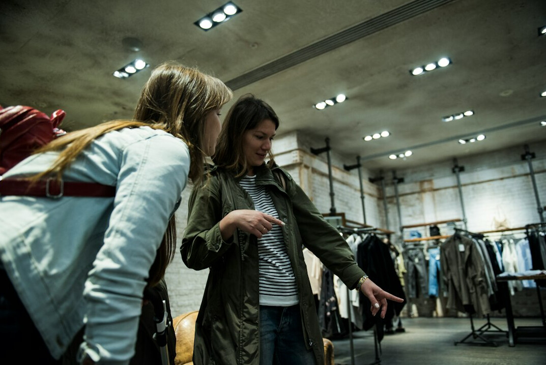 store detective observing shoppers