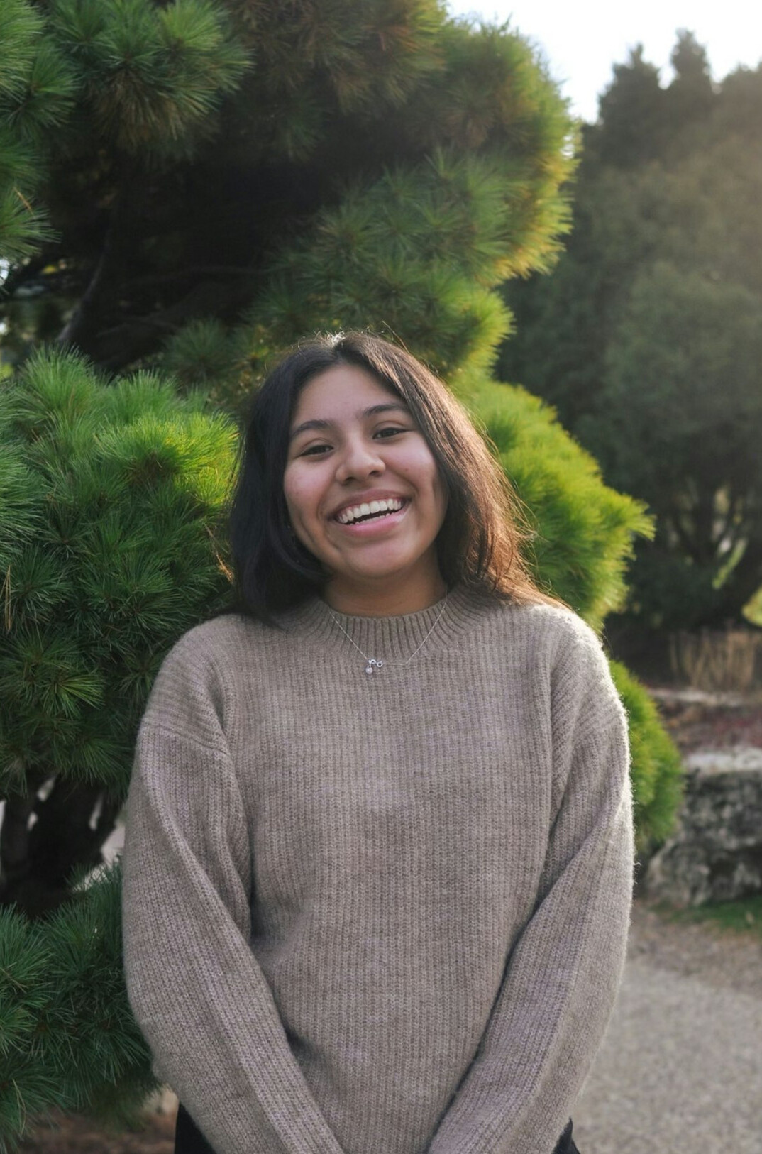 Portrait of a Latina woman editor smiling