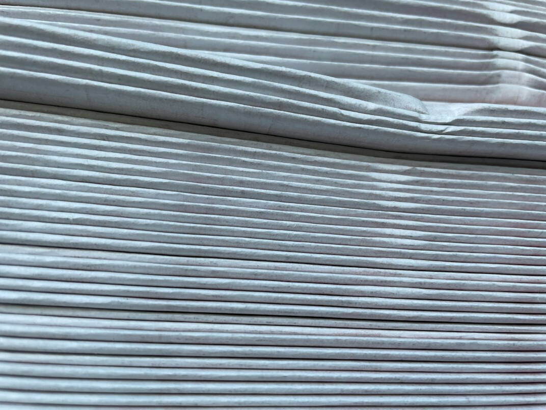 Stack of folded newspapers